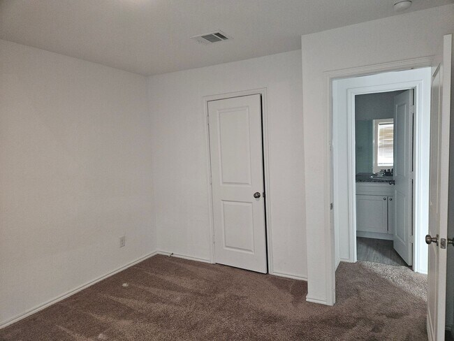 Building Photo - 4 Bedroom with 2 car garage