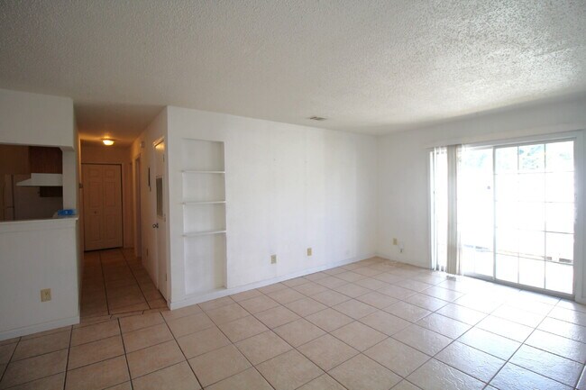 Building Photo - Spacious Vinyl-Sided 2BR Apartment with Open Layout, Private Patio, and Pet-Friendly Options – Av...
