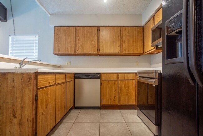 Building Photo - JULY SPECIAL - No Application Fee! Beautiful 2 Bedroom, 2 Bath Townhome in Gated Community!