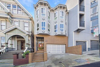 Building Photo - Quiet, light-filled 2BR condo with a private south-facing deck,