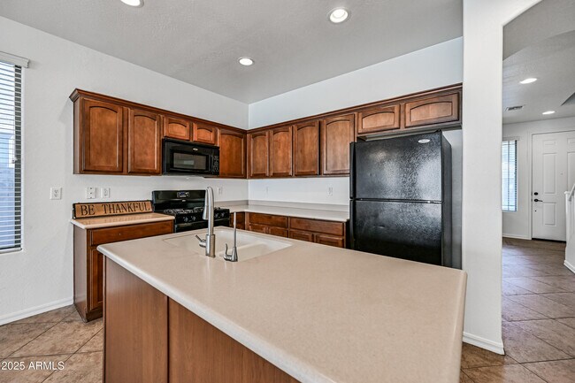 Building Photo - 14536 W Acapulco Ln
