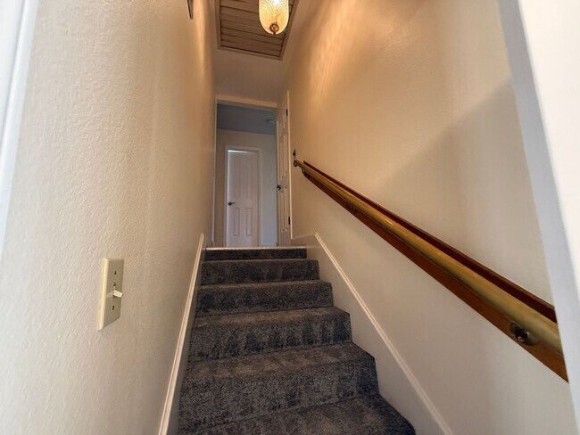 Building Photo - Stunning three-story home located in the c...