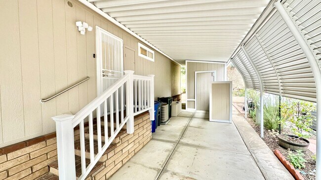 Building Photo - Light, Bright, and Freshly Updated Home in the Gated & Desirable Champagne Village 55+ Community!