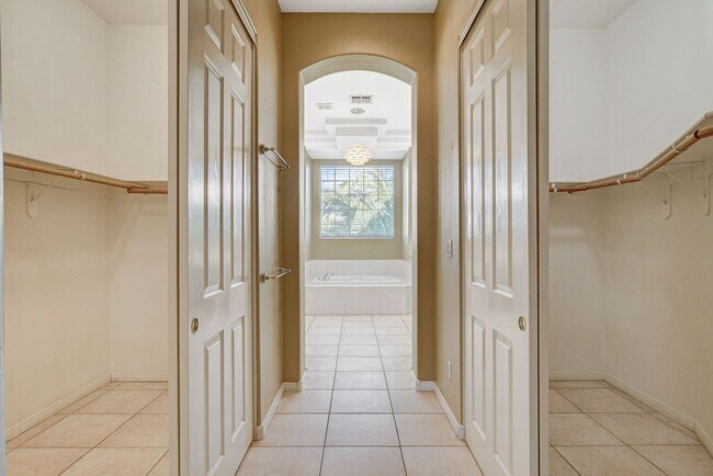Building Photo - Luxury 5-Bedroom Guard-Gated Home with Pool, Spa & 3 En-Suite Bedrooms