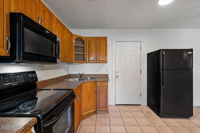 Building Photo - 6713 N 63rd Ave