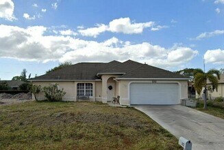 Building Photo - FIRST MONTH'S RENT FREE! STUNNING 4/2/2 IN NW CAPE!