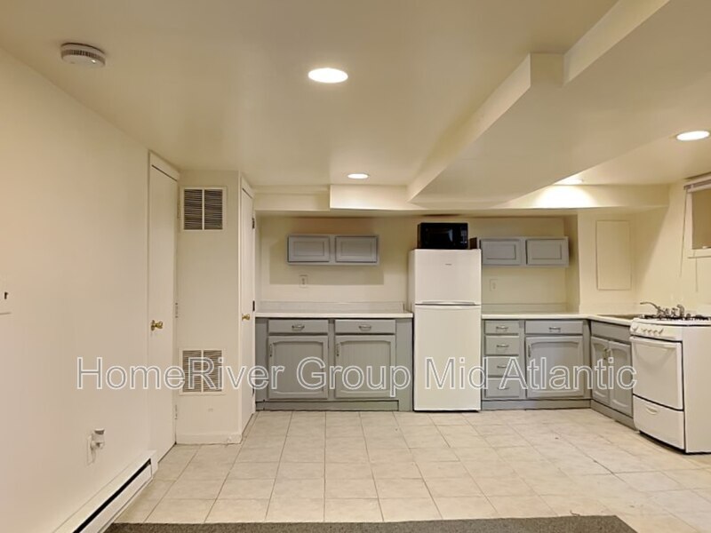 Building Photo - 6313 Frederick Rd