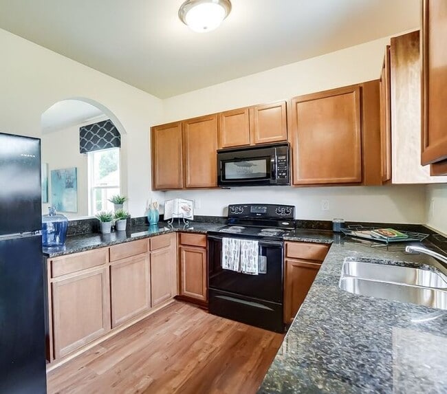 Building Photo - Experience the Space You Need and the Features You Deserve