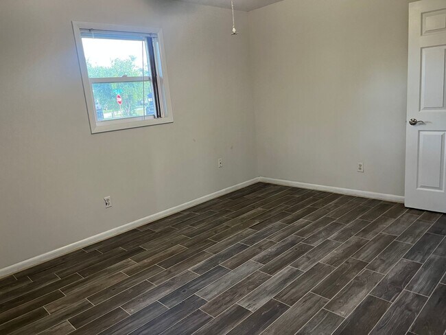Building Photo - 5-Bedroom Brick Home on Spacious Corner Lo...