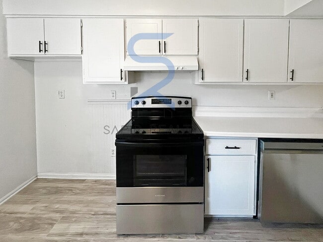 Building Photo - Move in before December 15th and choose your reward: a $250 Amazon Gift Card or a 55" Smart TV!