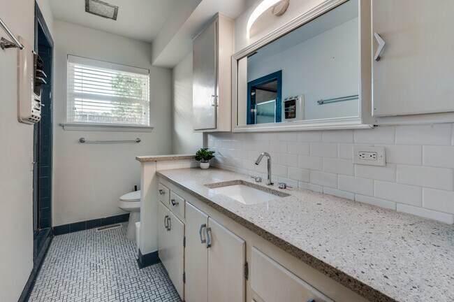 2nd of the three bathroom - 3310 Springwood Pl