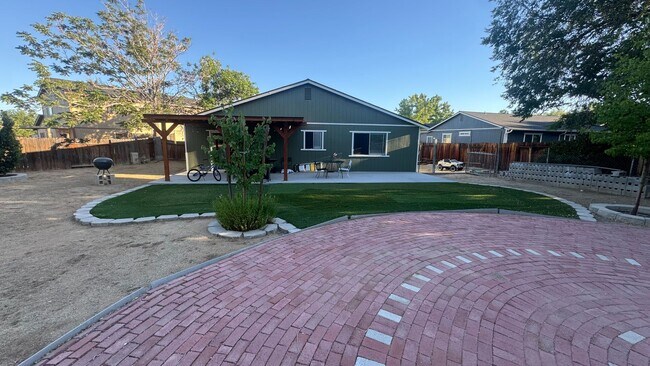 Building Photo - 4bed/2bath/2car garage. RV parking & massive landscaped backyard in cut-de-sac