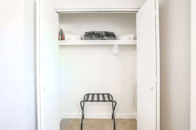 Closet with luggage rack, iron & ironing board - 2821 E Turney Ave