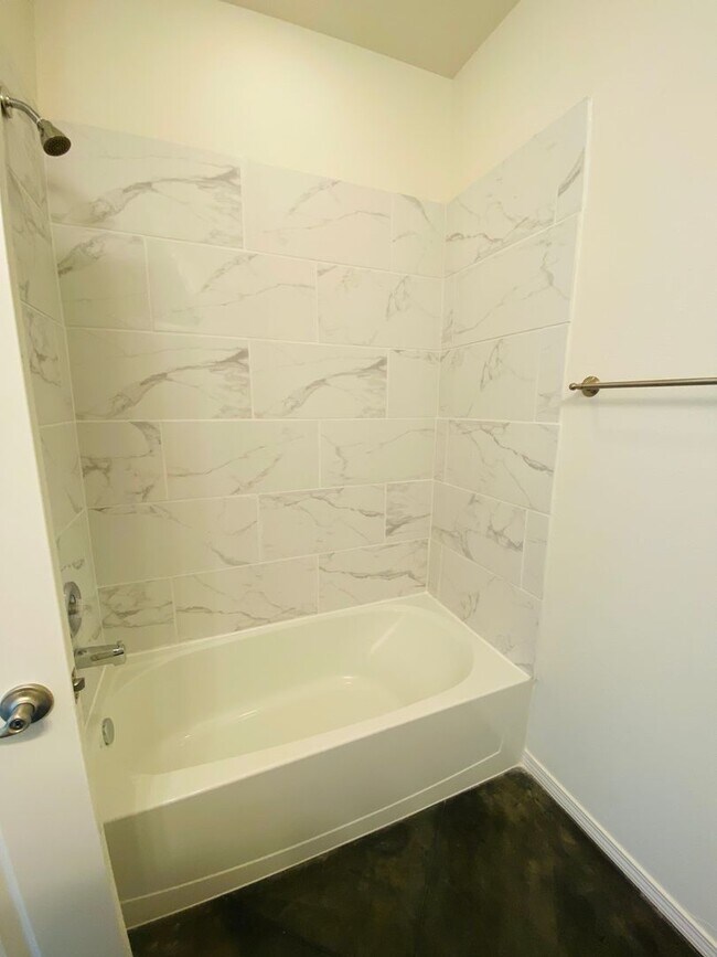 Building Photo - Stunning New 3/2 Townhomes