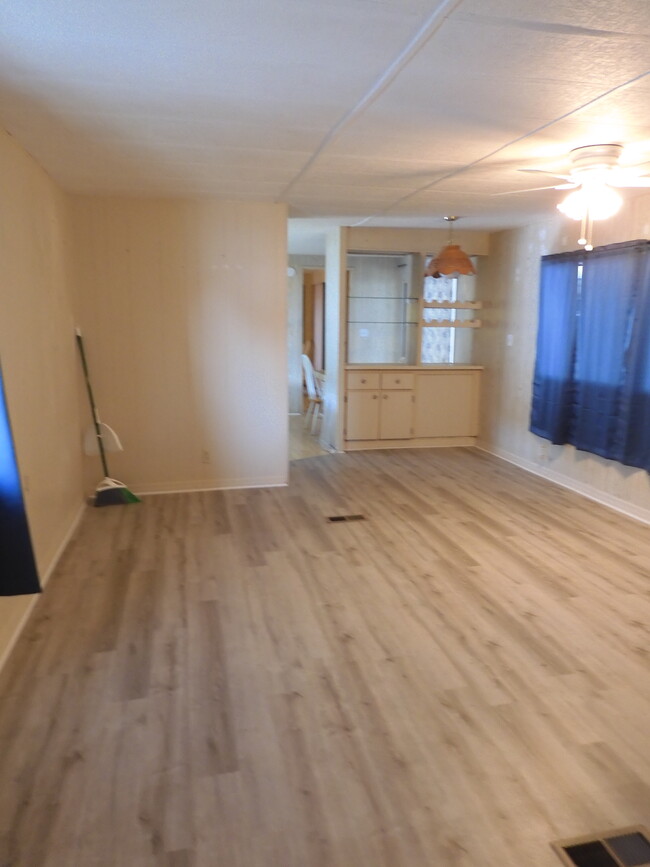 LIVING ROOM FACING KITCHEN - 7416 Fast Ln