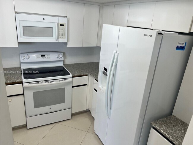 Building Photo - 6767 Collins Ave