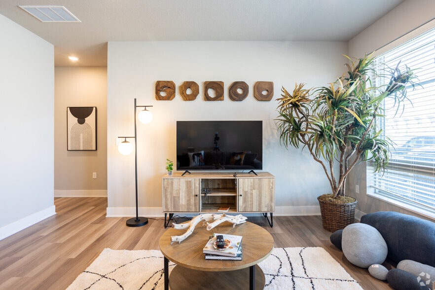 1 BR, 1BA - 904SF, Living Room - Sterling at Prairie Trail North