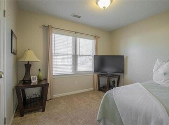 Building Photo - {5611} Updated OP Ranch + Two Car Garage + Fenced Yard and Stamped Concrete Patio Perfect for Spr...