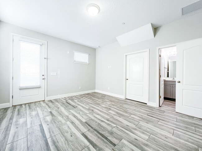 Building Photo - Luxury 4-Bedroom Townhome in Laureate Park – Now Available!