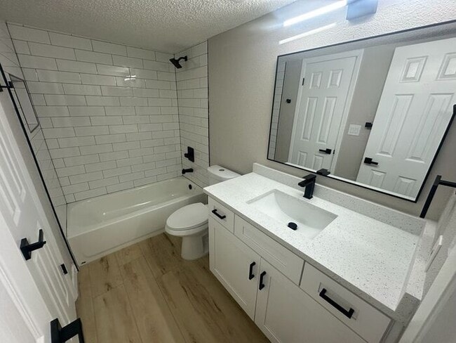 Building Photo - ** Move in Special HALF off your first months rent** New Remodeled 2 bed 1 bath condo in Casselbe...