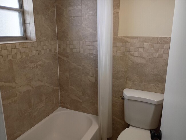 Building Photo - Stylish Remodeled Condo with Scenic Water ...