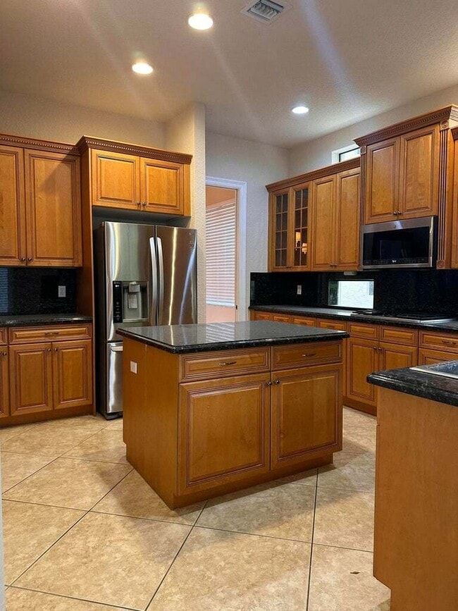 Building Photo - 10345 Medicis Pl