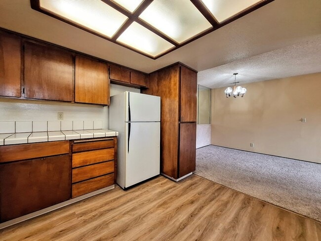 Building Photo - Spacious Second Floor 1bd Condo With Laundry In Unit, Pool, Balcony, & Carport!