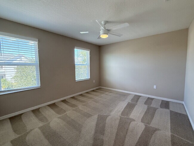 Building Photo - Spacious 4-Bedroom Retreat with additional office/den in the Heart of Trinity!