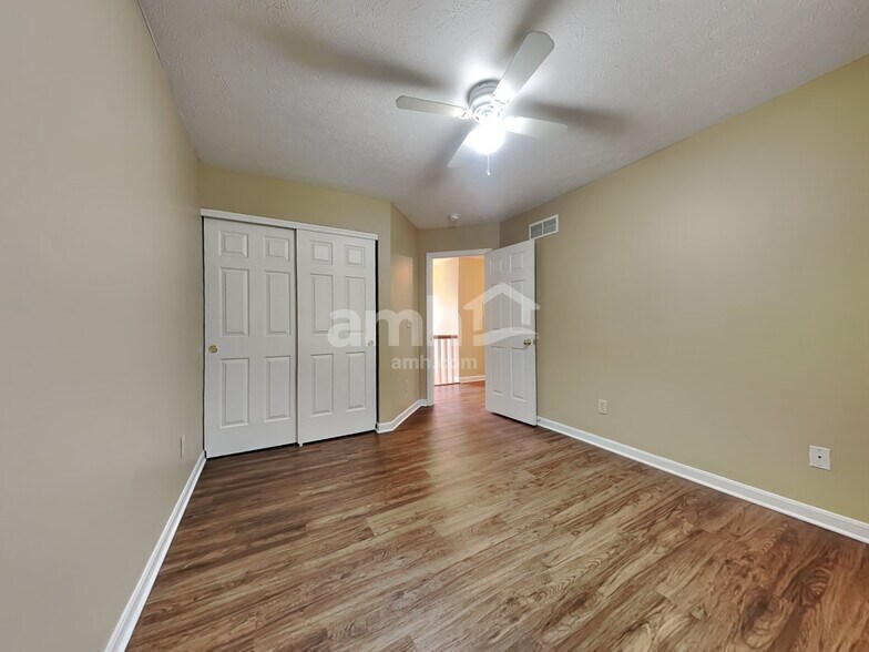 Building Photo - 8676 Woolstone Ct