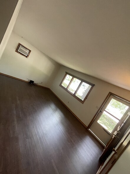 Living room with new flooring - 2630 Norwood Ln N