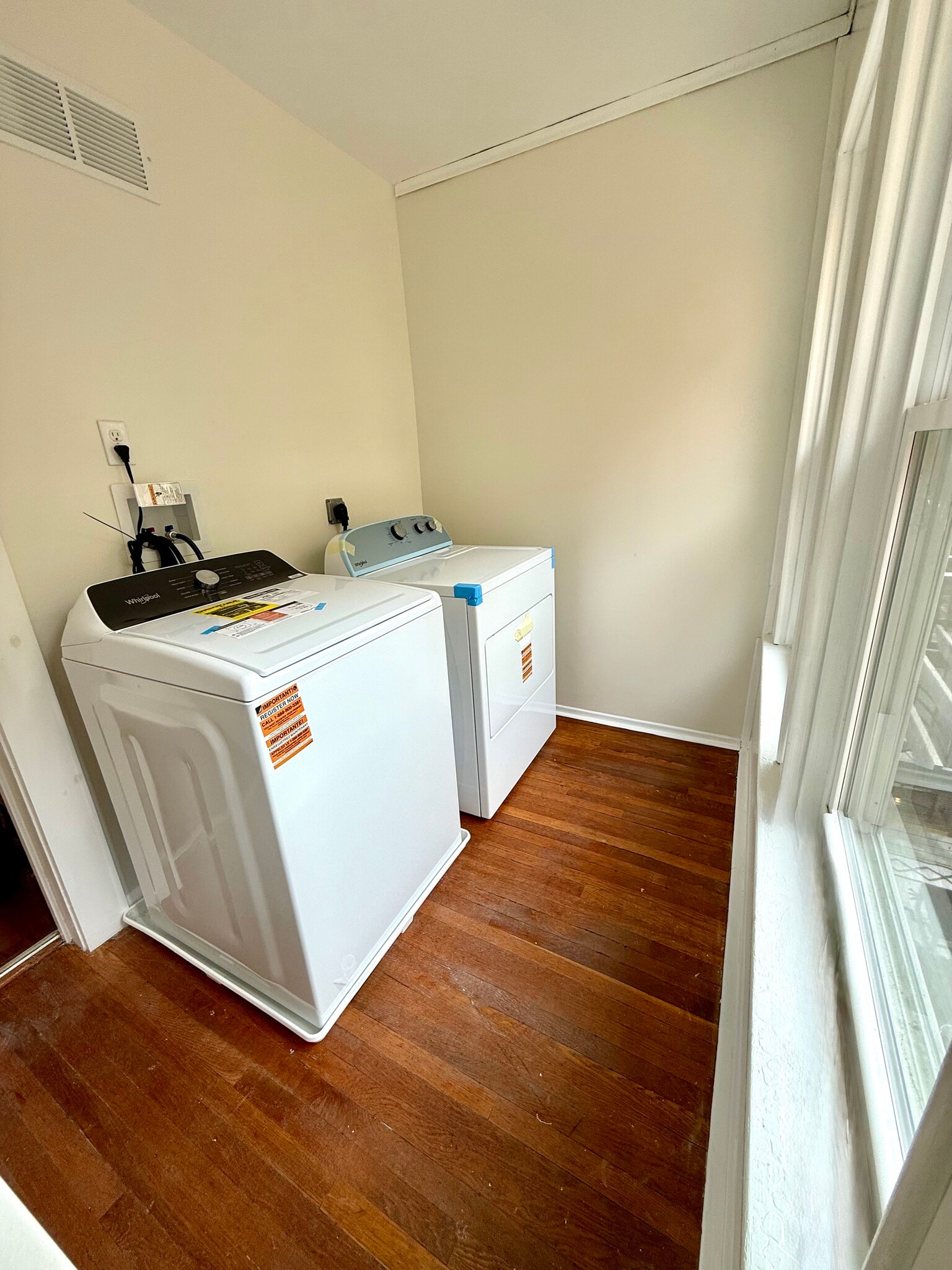 Upstairs laundry room with brand new washer and dryer - 2312 Hawthorne Ave