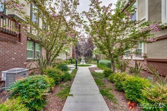 Building Photo - Modern 2-Bed Condo with Tesla Charger & At...