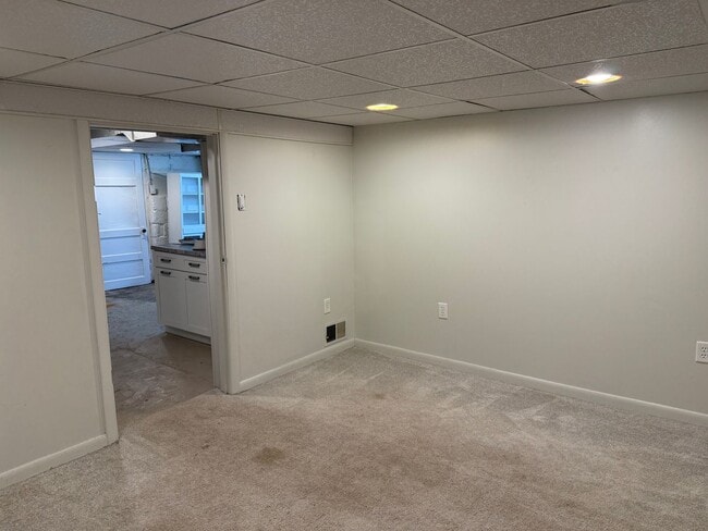 Building Photo - Newly Renovated 3-Bedroom, 1-Bathroom End-Row Townhome with Bonus Room & Backyard!