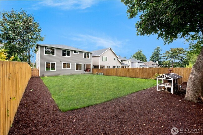 Building Photo - Luxury NW Living: 4 Bedroom Masterpiece with Dual Suites and Private Yard in Desirable Browns Point!