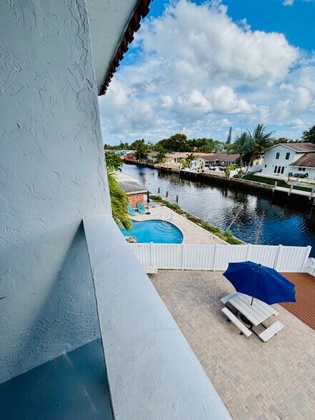 View from Side of Building and Coral Ridge Isles Neighborhood - 1400 NE 57th St