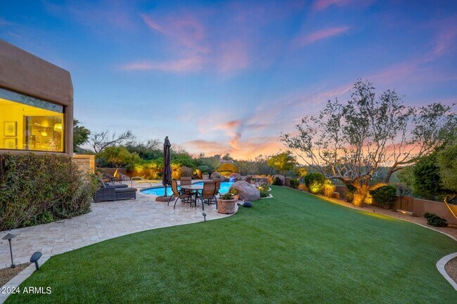 Building Photo - Beautiful custom home with backyard Oasis!