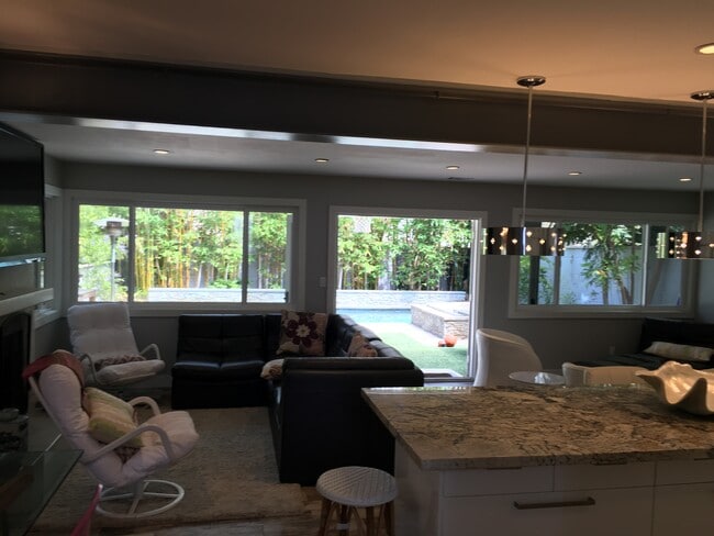 Living room off kitchen, opening up to back yard - 506 Anderson St
