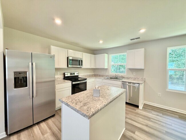 Building Photo - Stunning 3BD, 2.5BA End Unit Zebulon Townh...