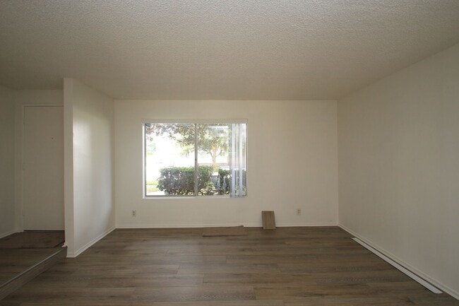 Building Photo - Coming Soon – Charming 3-Bedroom Townhome ...