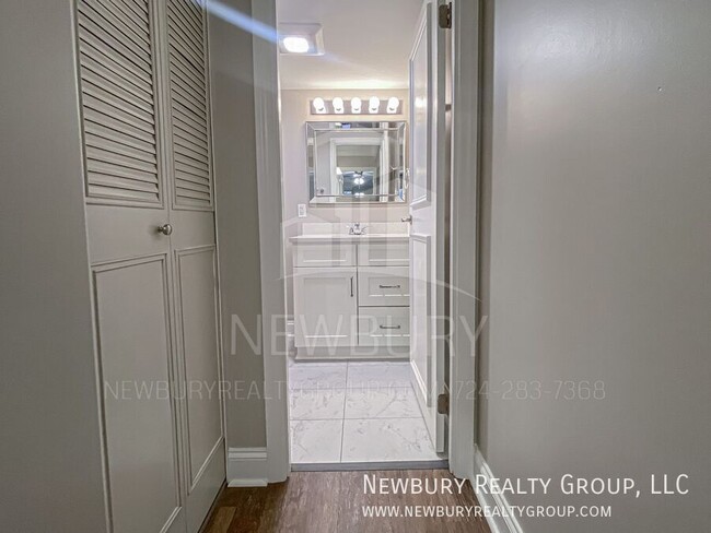 Building Photo - Luxury 1-Bedroom Penthouse with Modern Ren...