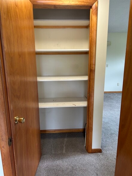 F 5 linen closet - Strnad Drive Apartments