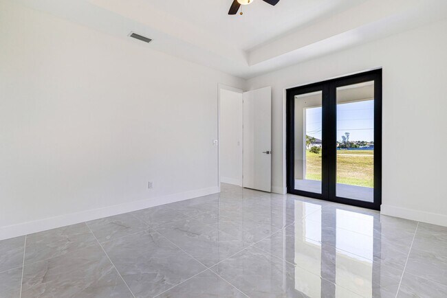 Building Photo - Brand-New Coastal Retreat | 4BR Home in NW Cape Coral