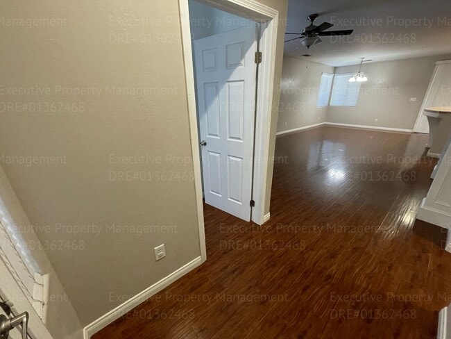 Building Photo - 4 bedrooms/ 2 bathrooms, with a patio.
