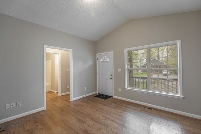 Building Photo - Like New Home off Freeman Mill. Just Painted, New Wood/Vinyl Flooring, Vaulted Ceilings, Front Po...