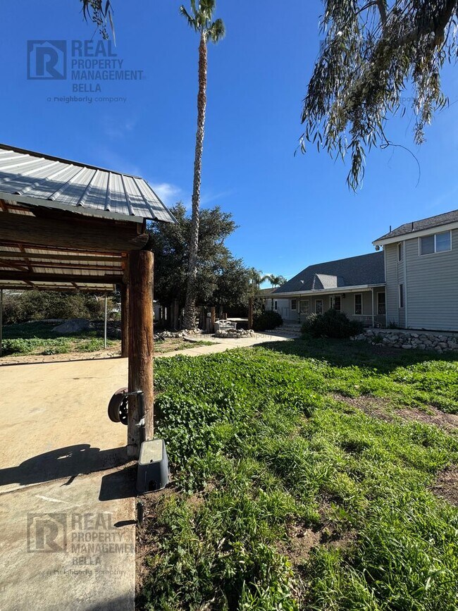 Building Photo - Peaceful Nuevo Living with Gated Driveway, Spacious Layout and Outdoor Living