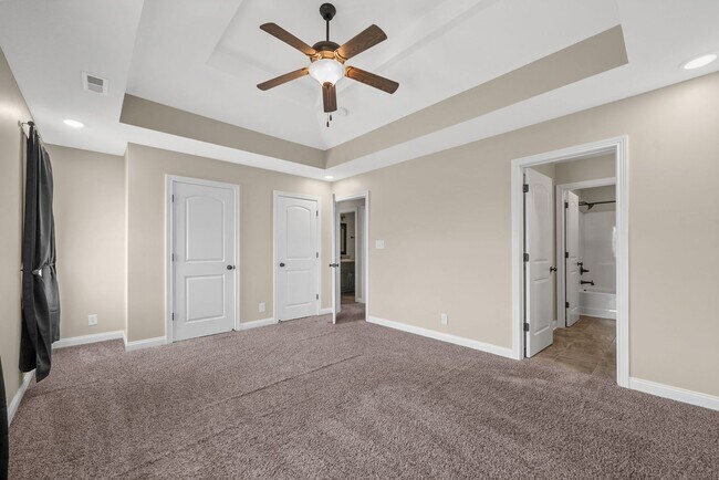 Building Photo - Spacious 4-Bedroom Home with Modern Upgrad...