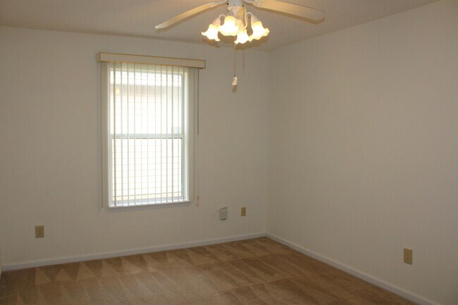 Building Photo - 11202 Mikris Dr N