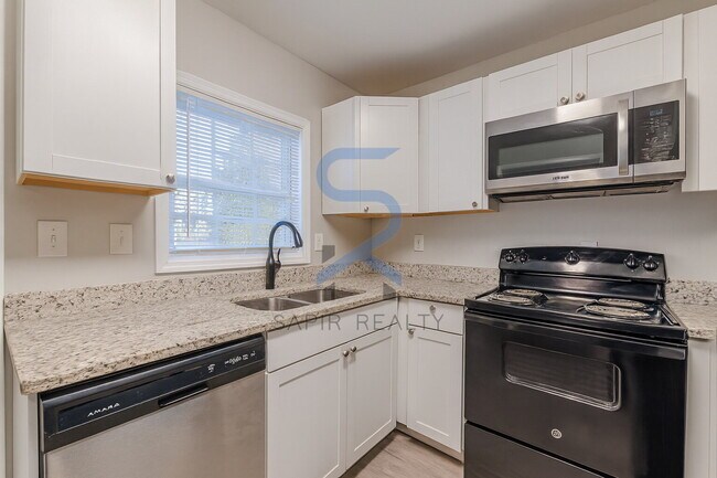 Building Photo - Move in before December 31st and choose your reward: a $250 Amazon Gift Card or a 55" Smart TV!