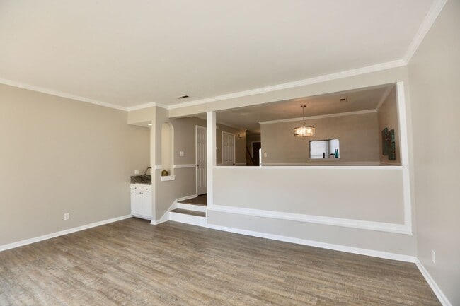 Building Photo - Updated End-Unit Brick Townhome Ready NOW!...
