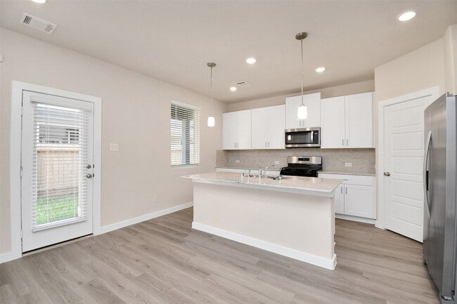 Building Photo - 8414 Rising Stream Dr